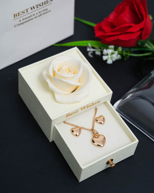 Cofre Rosa Eterna + Collar y Aretes Corazón (Acero inoxidable con baño de oro rosa) + Bolsa de regalo + 1 Rosa